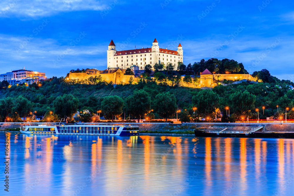 Wall mural bratislava, slovakia. view of the bratislava castle and danube river at the twilight. - Wall murals