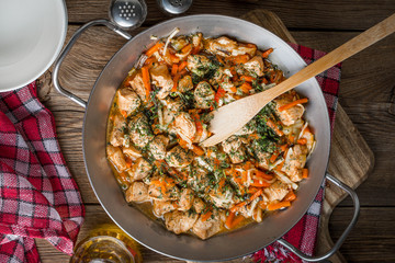 Fried chicken pieces with vegetables.