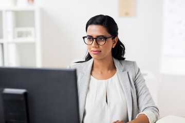 businesswoman with computer working at office