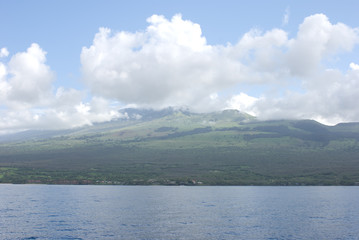 Maui with Molokini Crater. Molokini is popular for scuba diving and snorkeling