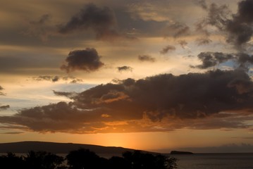 Tropical Sunset over beach in Maui Hawaii