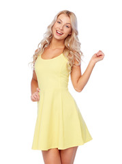 happy smiling beautiful young woman in dress