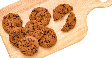 Biscuits with chocolate on a wooden board. Isolated background