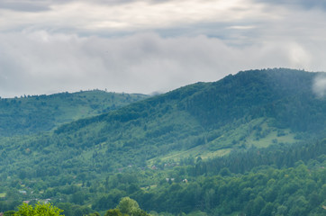 Naklejka na ściany i meble Carpathian mountains landscape view in Yaremche