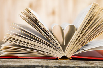 Open book on a wooden table