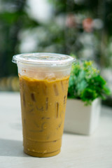 iced coffee on the table with bokeh background