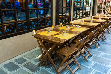 Tables near a restaurant in Venice, Italy