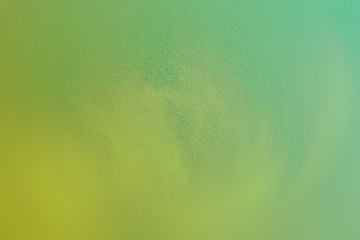 Abstract blurred texture background in green yellow tones