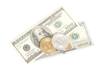 Golden end silver bitcoins with U.S. dollars isolated on white