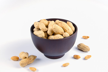 Peanuts in a wooden bowl.