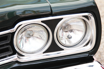 double front lights of vintage US car