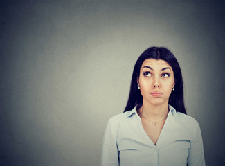 Confused thoughtful woman making up her mind