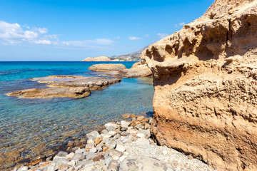 Fototapeta na wymiar Rock formations on Firiplaka Beach, one of the most popular beach situated at the southern side in Milos island. Cyclades, Greece. 