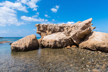 Rock formations on Firiplaka Beach, one of the most popular beach situated at the southern side in Milos island. Cyclades, Greece. 