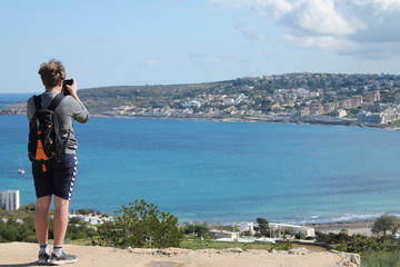 Young man travelling and exploring 