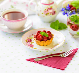 Mini tart with raspberries fruits