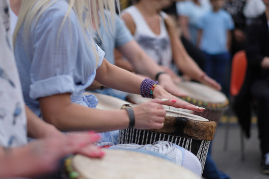 Speech By A Group Of Girls Playing Ethnic Drums At A Concert Of Percussion Music