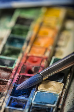 watercolors and paintbrush - art still life