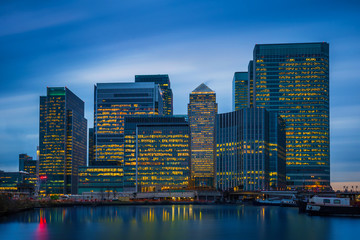 Fototapeta na wymiar London, England - The skyscrapers of Canary Wharf, the famous financial district of London at blue hour