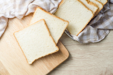 White bread on wood table for morning breakfast