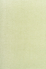 Sweater or scarf fabric texture large knitting. Knitted jersey background with a relief pattern. Wool hand- machine, handmade.
