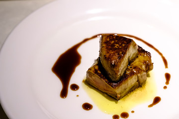 Foie gras is a luxury food product made of the liver of a duck or goose that has been specially fattened