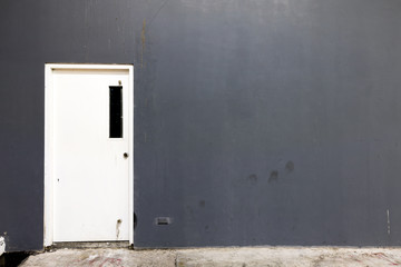 Old White door and blank wall