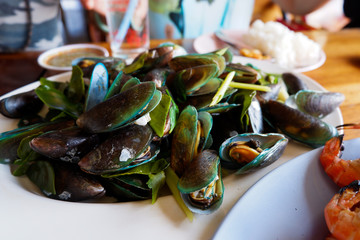 Boiled mussels with spicy seafood sauce