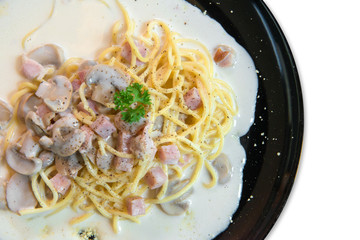 spaghetti with Mushroom sauce on black dish