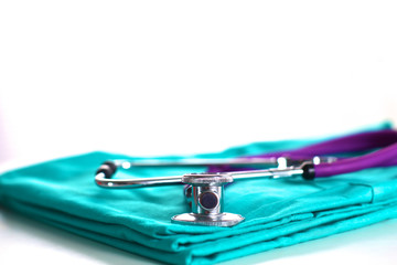Stethoscope on a background of medical coat