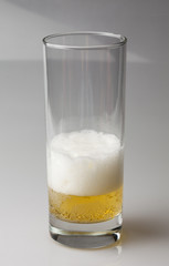 drops on glass of beer background texture. Beers bubbles