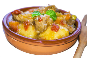 Clay casserole with beef stew isolated on white