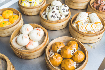 animal-shaped dumplings in bamboo steamers