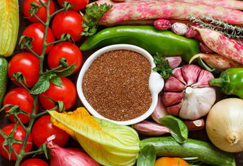 Uncooked teff grain with vegetables