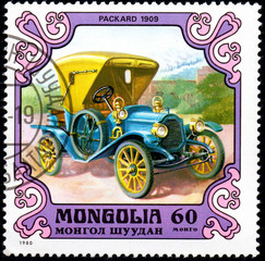 Fototapeta na wymiar UKRAINE - CIRCA 2017: A postage stamp printed in Mongolia shows motorcar Packard, United States 1909 from the series Antique Cars, circa 1980