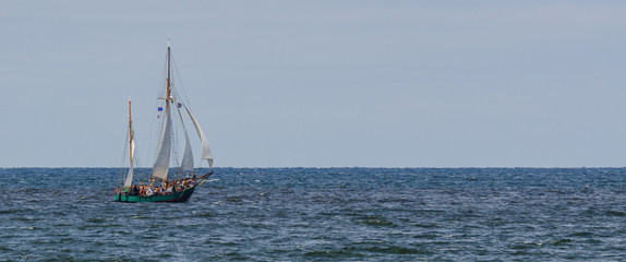 GAFF KETCH - Sailboat on a cruise with tourists on the sea © Wojciech Wrzesień