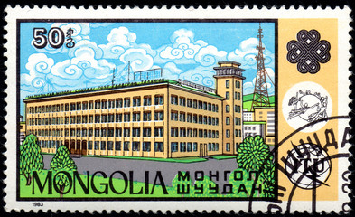 UKRAINE - CIRCA 2017: A postage stamp printed in Mongolia shows Central Postal office from the...