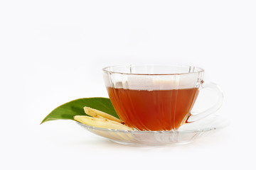 slice of fresh ginger root and tea isolated on white