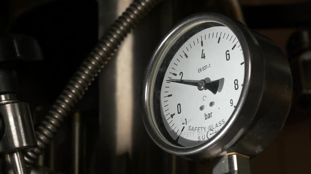 Gauge pressure in the pipeline. Pressure gauge, manometer closeup