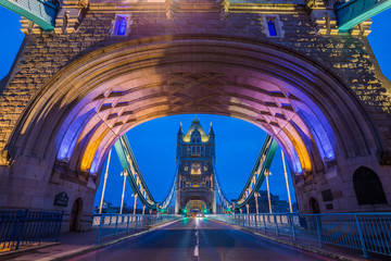 Obraz premium London, England - Entrace of the beautiful colorful Tower Bridge at early in the morning with blue sky and no people