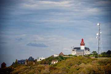 Fototapeta na wymiar Lighthouse (Phare) d'Ault, construit sur la falaise d'Onival 