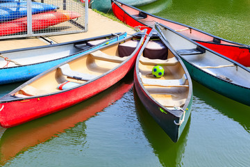 Fototapeta na wymiar Touring canoes moored at Shadwell Basin in London