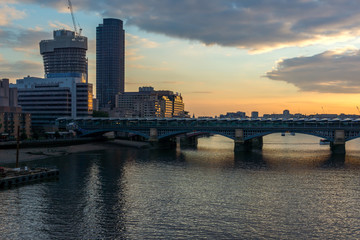 Amazing sunset Cityscape from Millennium Bridge and Thames River, London, Great Britain