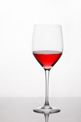 Glass of red wine with reflection
