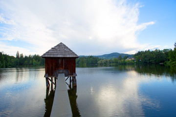 Fototapeta premium Fishing lodge above the lake