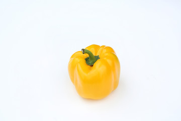 Yellow bell pepper isolated on white background.