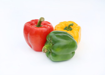 Green , red and yellow bell pepper isolated on white background.