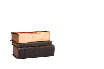 stack of old books on a white background