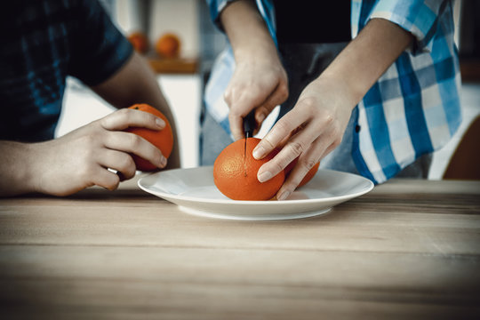 Cutting oranges, fruits