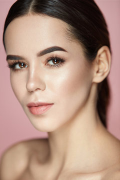 Beauty Makeup. Closeup Of Gorgeous Woman Face With Soft Skin